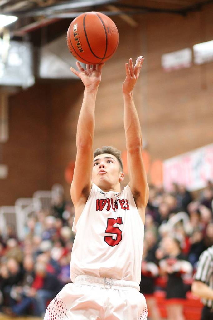 Cameron Toomey-Stout scores for the Wolves Friday.(Photo by John Fisken)