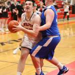 Coupevilles Kyle Rockwell, left, muscles by Chimacums Jacob Williamson.(Photo by John Fisken)