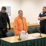 Convicted killer returns to court, pleads not guilty