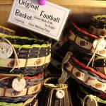 These round tray baskets are sized to fit a bag of chips and contain colors of popular football teams.