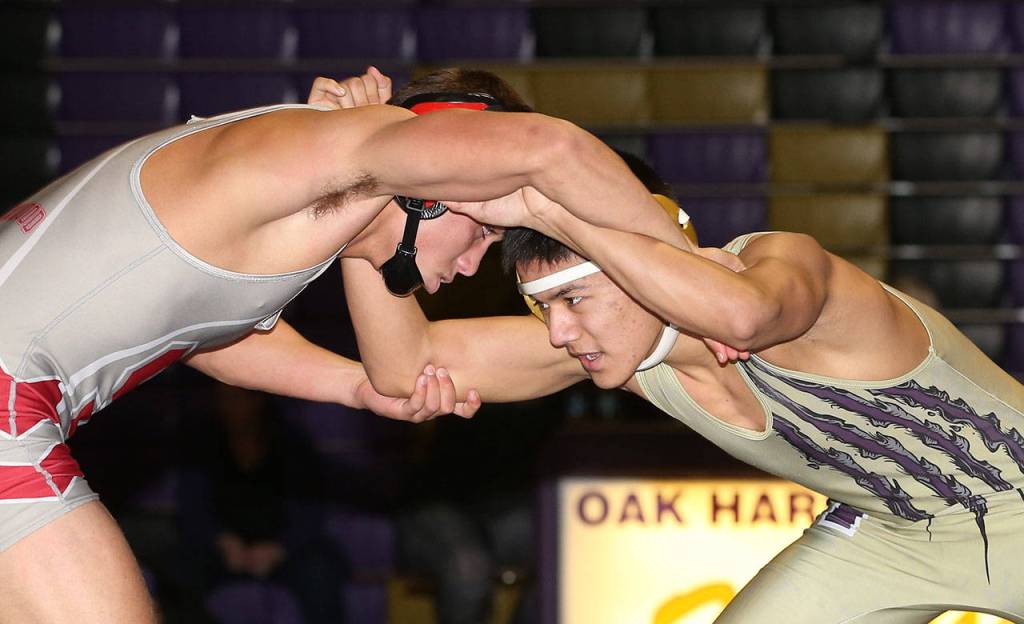Giovanni Ribay, right, locks up with Stanwoods Isaac Ortega.(Photo by John Fisken)