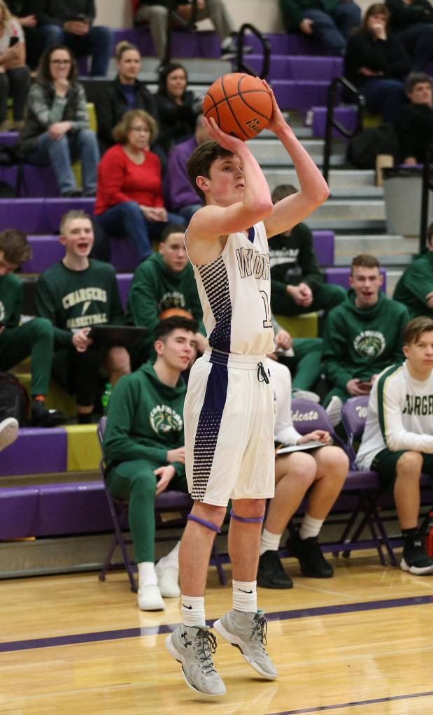 Gabe Salinger launches a three-point shot against Marysville Getchell Wednesday.(Photo by John Fisken)