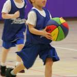 Nyjah Wooley dribbles the ball up the court as Emmitt Weston trails the play.(Photo by Jim Waller/Whidbey News-Times)