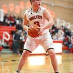 Hunter Downes looks for an outlet after grabbing a rebound.(Photo by John Fisken)