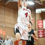 Hunter Smith scores on a breakaway against Klahowya.(Photo by John Fisken)