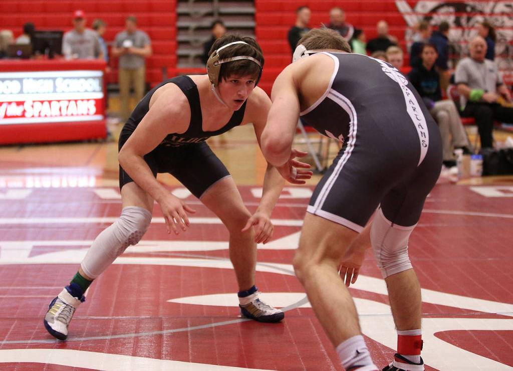Blake McBride looks for an opening in his championship bout with Stanwoods Mason Phillips.(Photo by John Fisken)