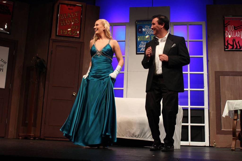 Emily Hoyt playing Ulla is the producers right-hand gal and eventual wife of Leo Bloom, played by Fernando Duran.