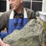 Dave Baumgartner holds one of the bigger finds from his rock collection. Baumgartner is vice president of the Whidbey Island Gem Club that has about 100 members.