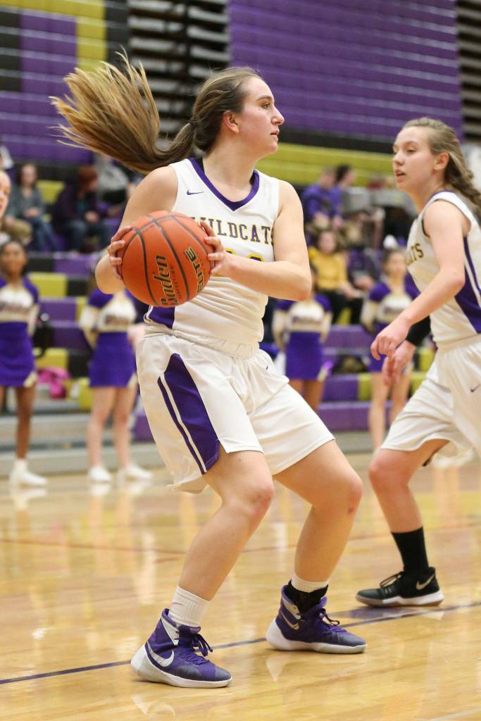 Samantha Hines prepares to outlet the ball after snaring a rebound.(Photo by John Fisken)