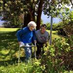 Last year, Cris Sanguin (right) led a team of Central Whidbey Hearts & Hammers volunteers to provide loving lawn care for Florence Harves, who was thrilled with the results. Photo provided