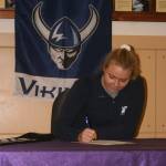 Caylie Etherington signs a letter of intent to play soccer at Western Washington University. (Photo by Jim Waller/Whidbey News-Times)