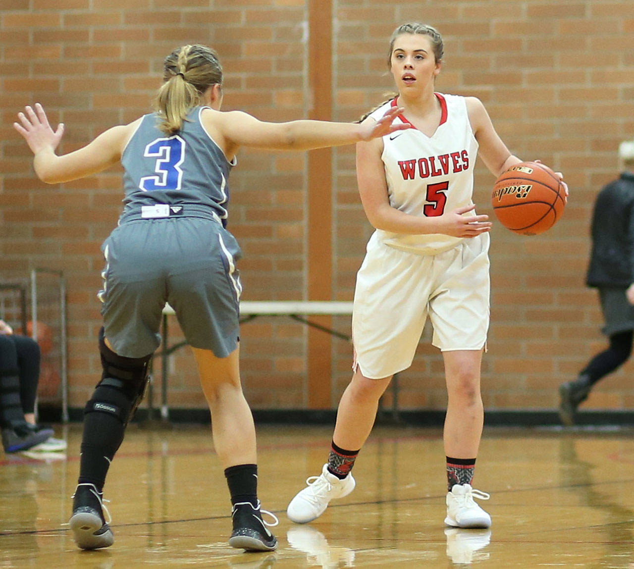 Coupevilles Kyla Briscoe (5), shown here in a game earlier this season, is confident the Wolves have corrected the problems they encountered in a December loss to Bellevue Christian, their district tournament opponent Saturday. (Photo by John Fisken)
