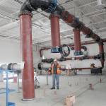 Photo by Jessie Stensland / Whidbey News-Times                                Brett Arvidson, project engineer, stands inside one of the buildings that makes up the sewage treatment plant being built in Oak Harbor.