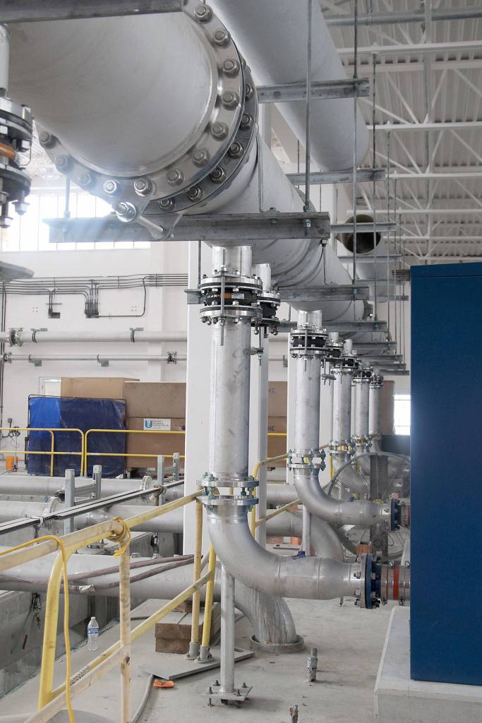 Photo by Jessie Stensland / Whidbey News-Times                                Brett Arvidson, project engineer, stands inside one of the buildings that makes up the sewage treatment plant being built in Oak Harbor.
