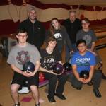 The Oak Harbor High School bowling team will be shooting for the state title next weekend. In the front row are Daniel Johnson, left, Devin McCardle and Earl Angeles. In the back are head coach Jason Youngsman, left, Megan Flood, assistant coach John Youngsman and Niko Hawkins. (Photo by Jim Waller/Whidbey News-Times)