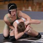 Oak Harbors Jakob Dailey, top, defeats Shorecrests Kelvin Schmidt 3-1 to take fifth place.(Photo by John Fisken)