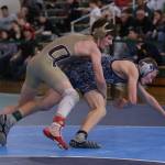 Oak Harbors Blake McBride, right, takes down Ryan Nett of Southridge; Nett, however, recovered to win the third-place match.(Photo by John Fisken)