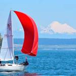 A San Juan 24 takes advantage of the wind and beauty of Penn Cove last summer. (Photo by Brian Paine)