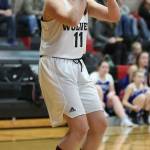 Seventh-grader Carolyn Lhamon sets up for a shot Thursday.(Photo by John Fisken)