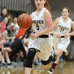 Maddie Georges leads the Coupeville seventh-graders fastbreak.(Photo by John Fisken)