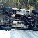Man uninjured in rollover on icy Madrona Way