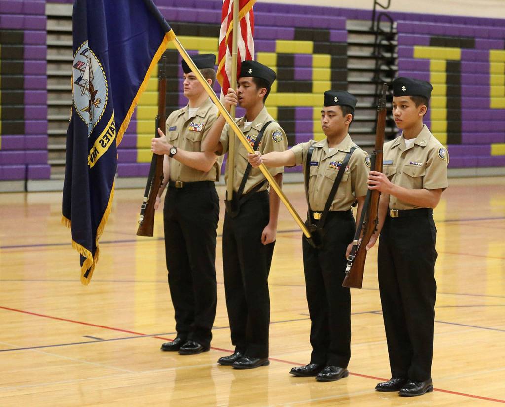 Oak Harbor color guard No. 1  Bradley Moon, left, Jhaylan Munger, Aldrin Bonganay and John Francisco  took third in Saturdays meet.(Photo by John Fisken)