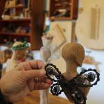 Janet Lewis found many uses for discarded objects, such as this old machine belt adorned with old jewelry to form butterfly wings.