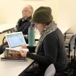 Melissa Correia participates in Washington State University Extension, Island Countys Cultivating Success class. Loren Imes, facilitator of the class, sits behind her. A new contract restructuring the universitys relationship with the county will allow the extension to increase its programming by 20 percent. Photo by Laura Guido/Whidbey News-Times