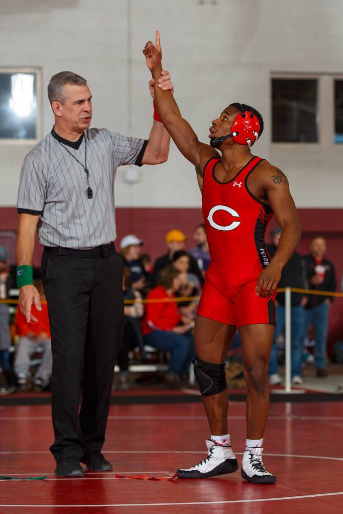 Oak Harbor graduate Jahleel Vester wins a match for Central College at the Under Armour Wrestling Invitational Jan. 6. (Photo by Dan L. Vander Beek)