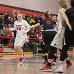 Coupevilles Kailey Kellner (33), playing for DYouville College, looks to the post in a game this season. (Photo courtesty of DYouville Athletics)