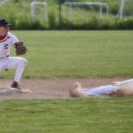 Returning Coupeville second baseman Nick Etzell tags out a Chimacum base runner last season. (Photo by John Fisken)