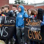 Oak Harbor High School students joined thousands of young people across the nation at 10 a.m. Wednesday for a 17-minute walkout to advocate for stricter gun control and to honor the 17 victims of the shooting in Parkland, Fla. Photo by Laura Guido/Whidbey News-Times