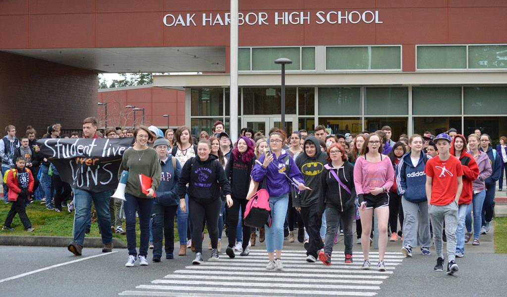 Students walked out of Oak Harbor High School at 10 a.m. Wednesday for 17 minutes in recognition of the 17 victims in the Parkland, Fla. shooting. The student-led effort advocated for stricter gun control. Photo by Laura Guido/Whidbey News-Times