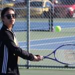Shaina Aguirre competes for Oak Harbor in first doubles Thursday. (Photo by John Fisken)