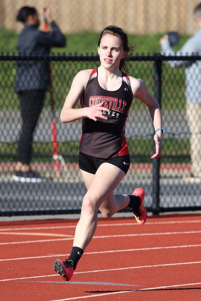 Coupevilles Mallory Kortuem heads around the final turn in the 400 meters.(Photo by John Fisken)
