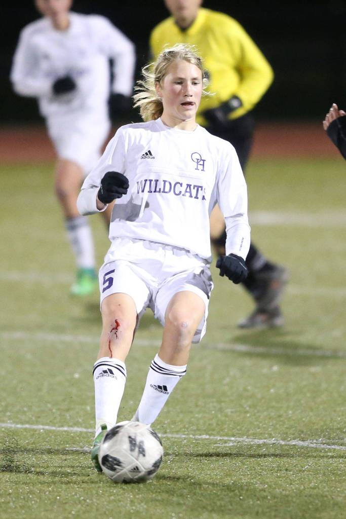 Mason Rhodes controls the ball for the Wildcats in Fridays match.(Photo by John Fisken)