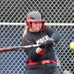 Veronica Crownover puts the ball in play for the Wolves.(Photo by John Fisken)