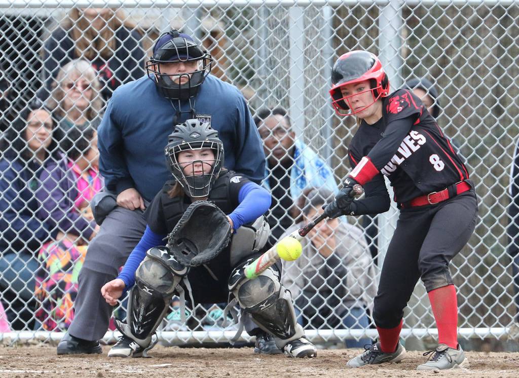 Lauren Rose raps one of her two base hits in Saturdays win at South Whidbey.(Photo by John Fisken)