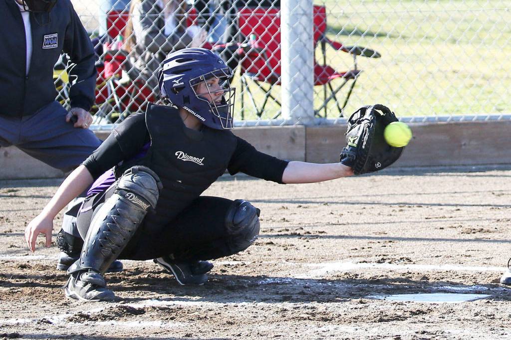 Oak Harbor catcher Samantha Payne looks in a pitch.(Photo by John Fisken)