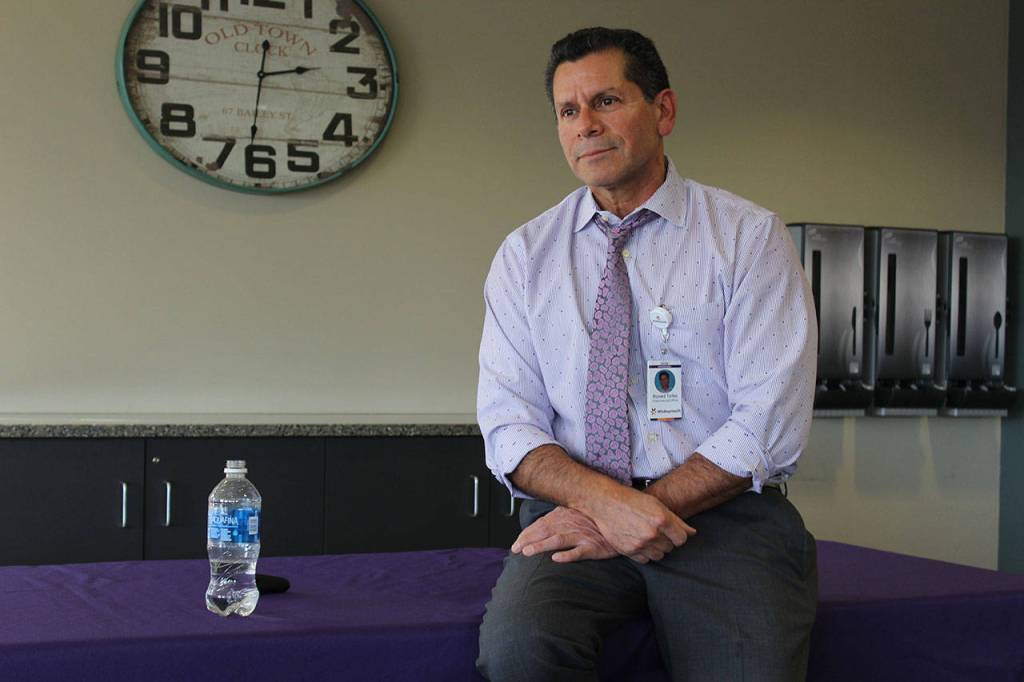 Ron Telles, chief financial officer, answers questions from the audience.