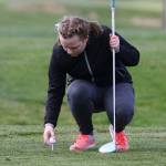 Beth Paul tees up the ball during Tuesdays Whidbey Shootout.(Photo by John Fisken)