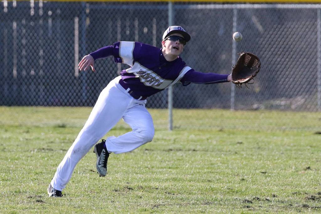 Austin Boesch reaches for a catch Tuesday.(Photo by John Fisken)