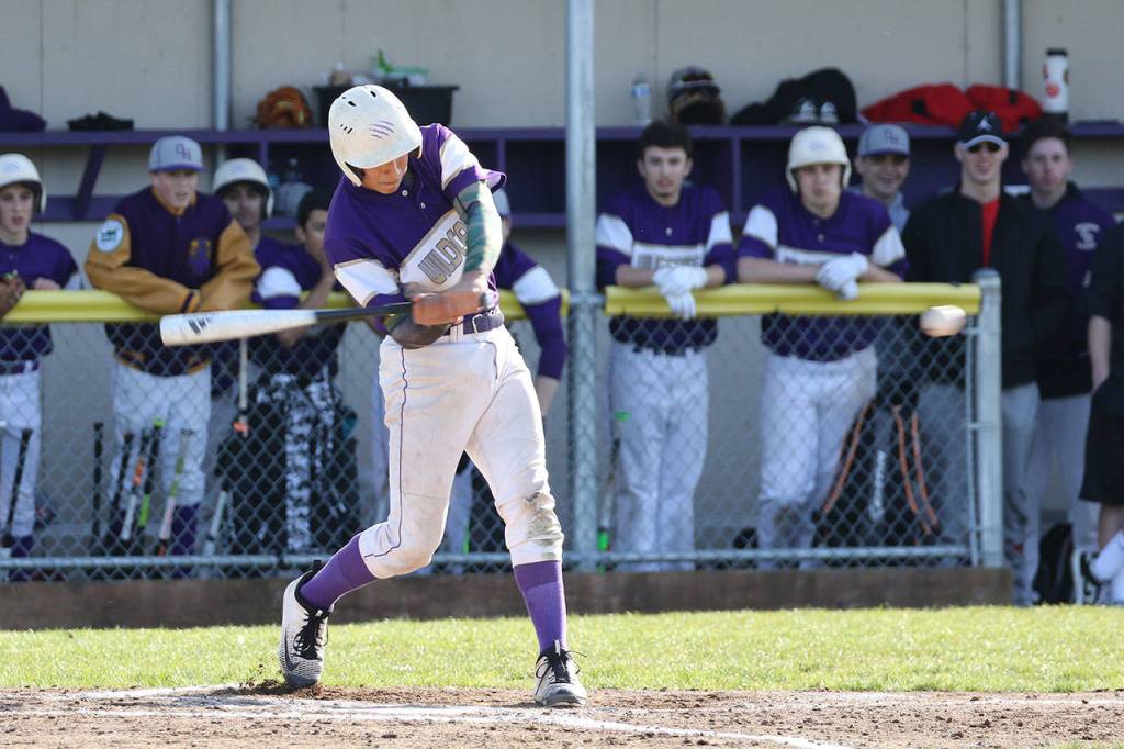 Aaron Martinez attacks the first pitch of the bottom of the first inning Tuesday. Martinez ripped a single up the middle with the swing.(Photo by John Fisken)