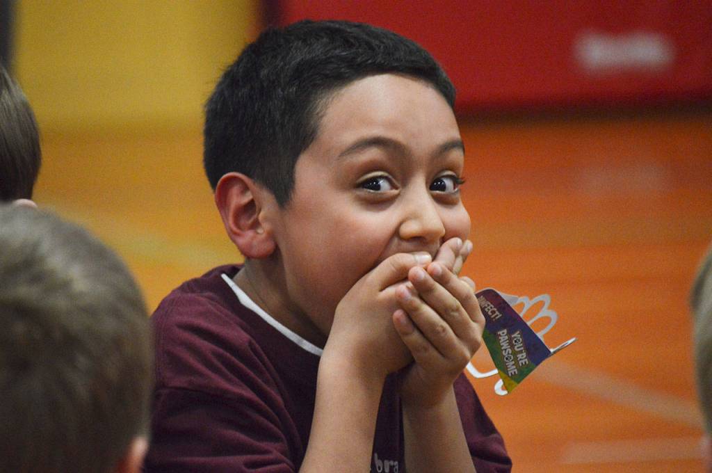 Photo by Laura Guido/Whidbey News Group                                David Ybarra can barely contain his excitement as he realizes his team won the all-island third grade reading challenge Tuesday night at Oak Harbor Elementary.