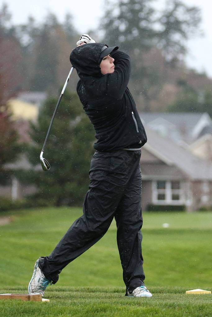 Beth Paul tees off for the Wildcats.(Photo by John Fisken)