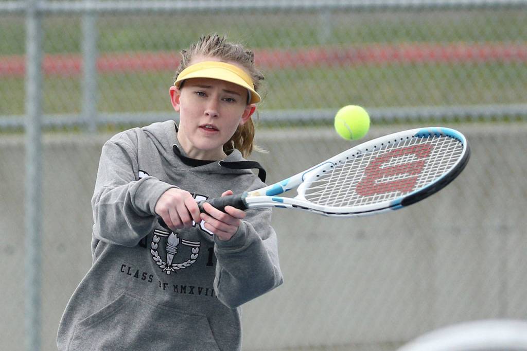 Johanna Schmidt swats a backhand Friday.(Photo by John Fisken)