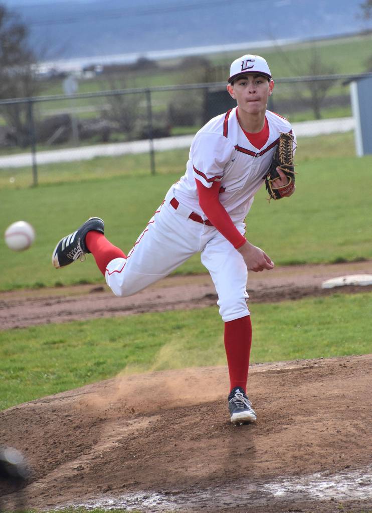 Hunter Smith throws a strike against North Mason. (Photo by Karen Carlson)
