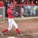 Chelsea Prescott drives the ball to center field Friday.(Photo by John Fisken)
