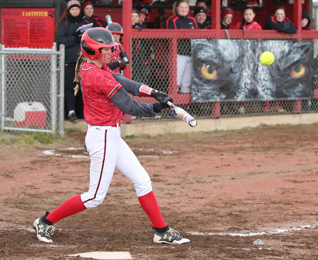 Chelsea Prescott drives the ball to center field Friday.(Photo by John Fisken)