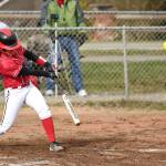 Lauren Rose rips a triple against North Mason.(Photo by John Fisken)